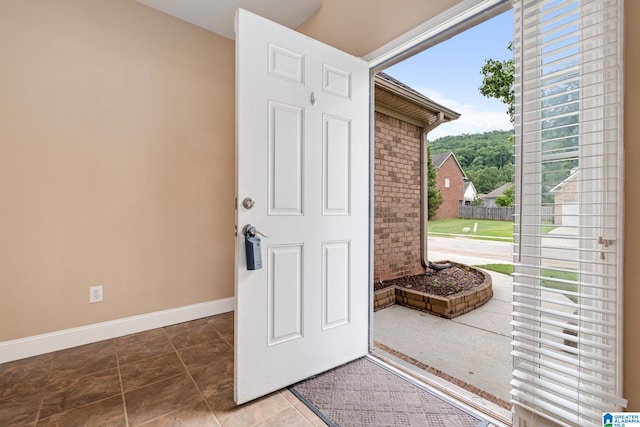 538 Forest Lakes Dr, Sterrett, AL 35147 - tiled entryway featuring baseboards