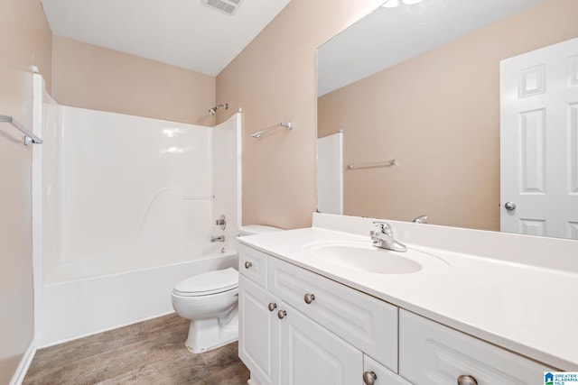 538 Forest Lakes Dr, Sterrett, AL 35147 - full bath featuring toilet, vanity, wood finished floors, and bathing tub / shower combination