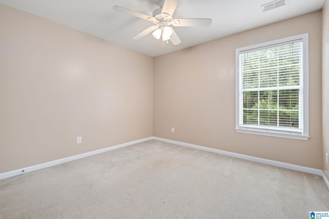 538 Forest Lakes Dr, Sterrett, AL 35147 - spare room featuring baseboards, light colored carpet, and ceiling fan