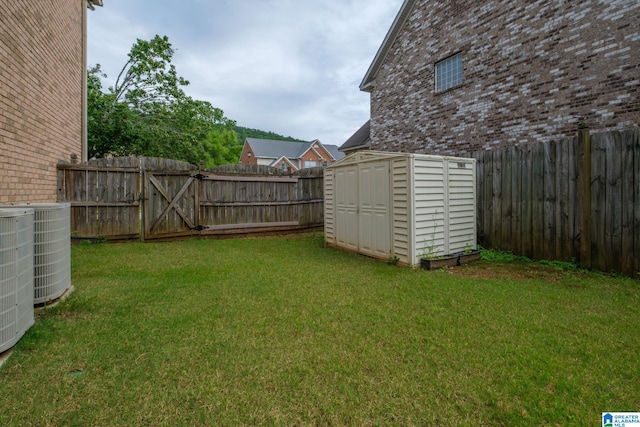 538 Forest Lakes Dr, Sterrett, AL 35147 - view of yard featuring central AC and a gate