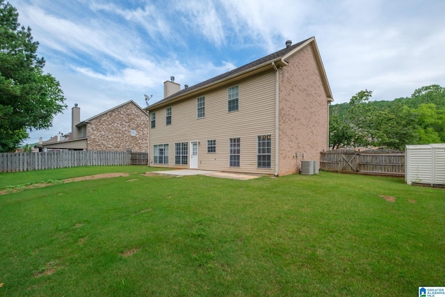 538 Forest Lakes Dr, Sterrett, AL 35147 - back of property featuring a patio area, brick siding, a chimney, and cooling unit