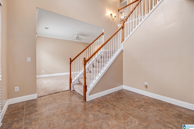 538 Forest Lakes Dr, Sterrett, AL 35147 - stairway with ceiling fan, baseboards, and stone finish floors