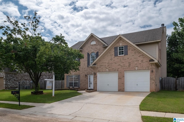 538 Forest Lakes Dr, Sterrett, AL 35147 - view of front of house featuring concrete driveway, an attached garage, and brick siding