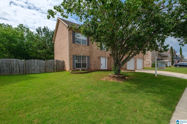 538 Forest Lakes Dr, Sterrett, AL 35147 - view of front of house with driveway, a garage, brick siding, and a gate