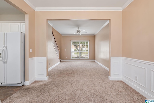 538 Forest Lakes Dr, Sterrett, AL 35147 - empty room featuring ornamental molding, carpet floors, ceiling fan, wainscoting, and stairway