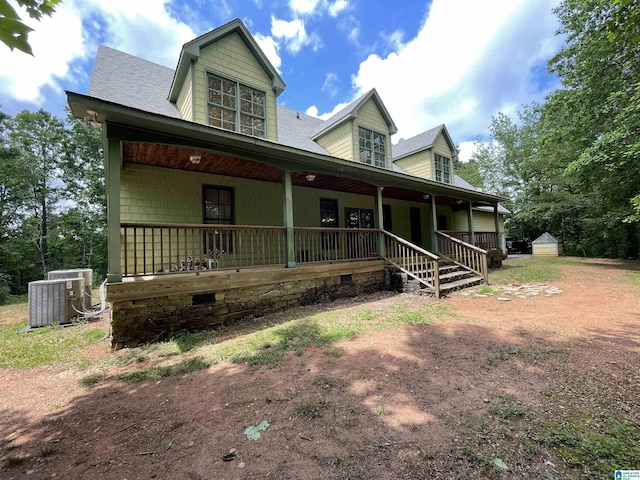 720 Good Hope Delta Rd, Delta, AL 36258 - view of front of home with covered porch, central AC unit, and a shingled roof