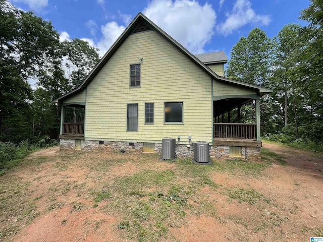 720 Good Hope Delta Rd, Delta, AL 36258 - view of side of property featuring central AC, crawl space, and covered porch