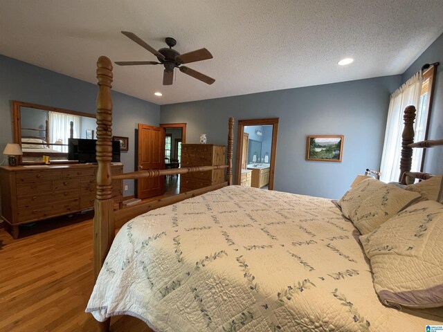 720 Good Hope Delta Rd, Delta, AL 36258 - bedroom with wood finished floors, recessed lighting, a textured ceiling, and a ceiling fan