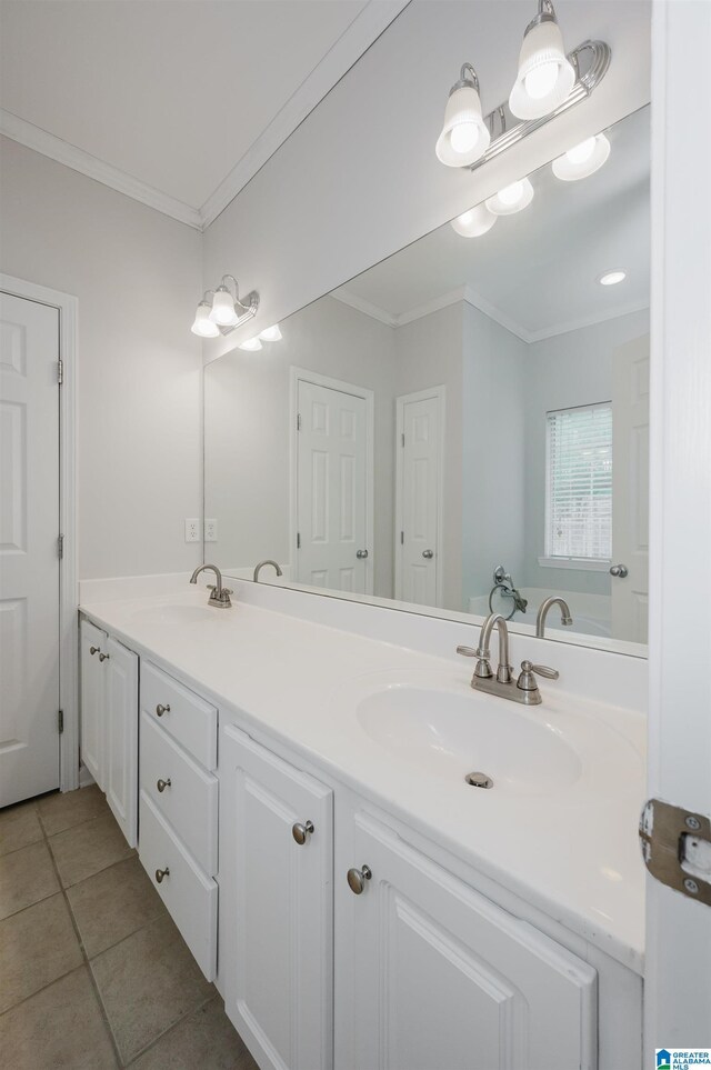 2246 Clairmont Dr, Leeds, AL 35094 - full bath with ornamental molding, double vanity, and tile patterned flooring