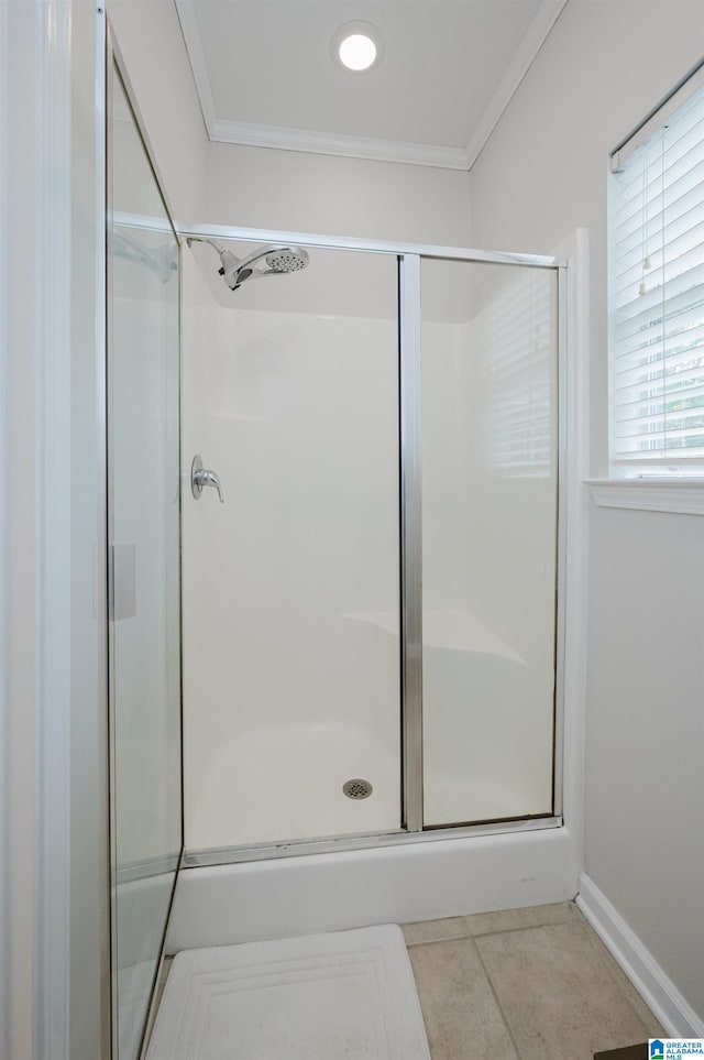 2246 Clairmont Dr, Leeds, AL 35094 - full bath with a shower stall, crown molding, tile patterned floors, and baseboards
