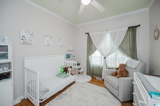 2246 Clairmont Dr, Leeds, AL 35094 - bedroom with wood finished floors, crown molding, and ceiling fan