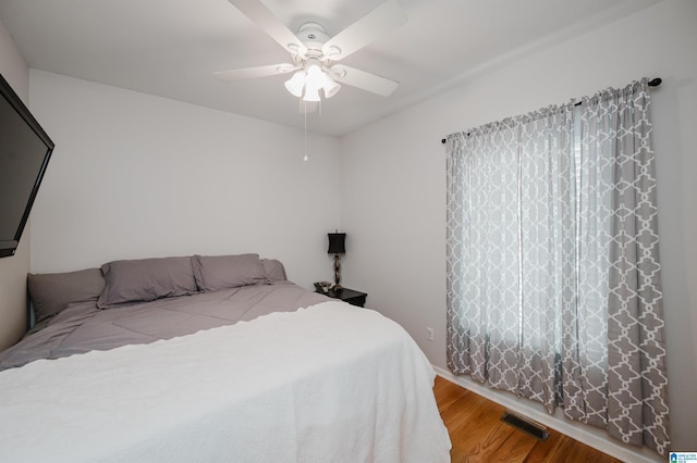 2246 Clairmont Dr, Leeds, AL 35094 - bedroom featuring wood finished floors and ceiling fan