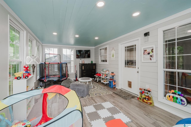 2246 Clairmont Dr, Leeds, AL 35094 - recreation room featuring wood finished floors, recessed lighting, and ornamental molding