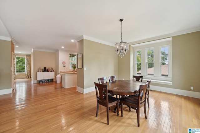 1710 Cullom St S, Birmingham, AL 35205 - dining room with a chandelier, ornamental molding, light wood-style floors, baseboards, and recessed lighting