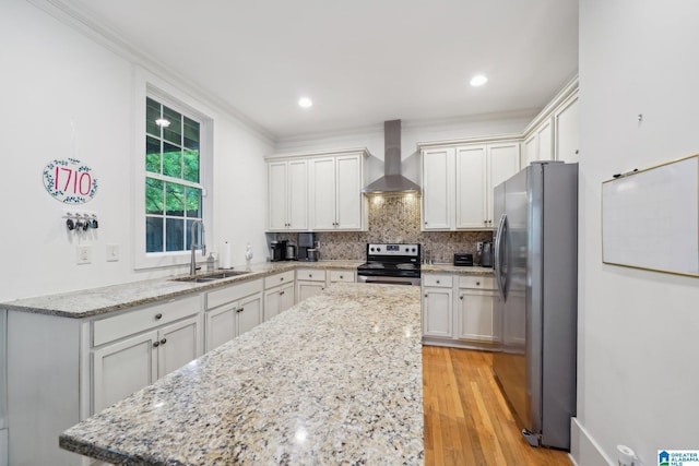 1710 Cullom St S, Birmingham, AL 35205 - kitchen featuring appliances with stainless steel finishes, wall chimney range hood, a sink, a center island, and decorative backsplash