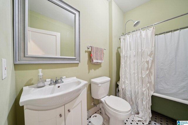 1710 Cullom St S, Birmingham, AL 35205 - full bathroom featuring vanity, toilet, shower / tub combo with curtain, and tile patterned floors