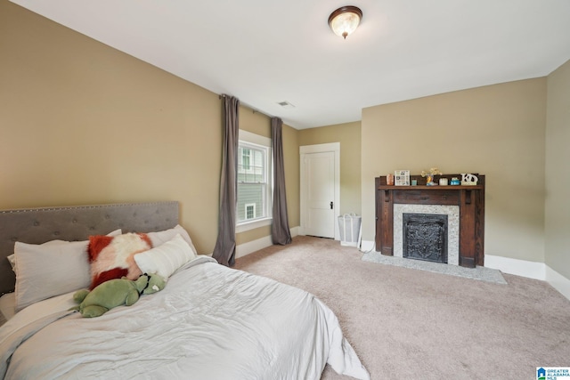 1710 Cullom St S, Birmingham, AL 35205 - bedroom with baseboards, carpet floors, and a fireplace with flush hearth