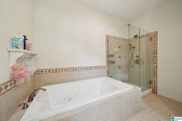 1710 Cullom St S, Birmingham, AL 35205 - bathroom with a whirlpool tub, a stall shower, and tile patterned floors
