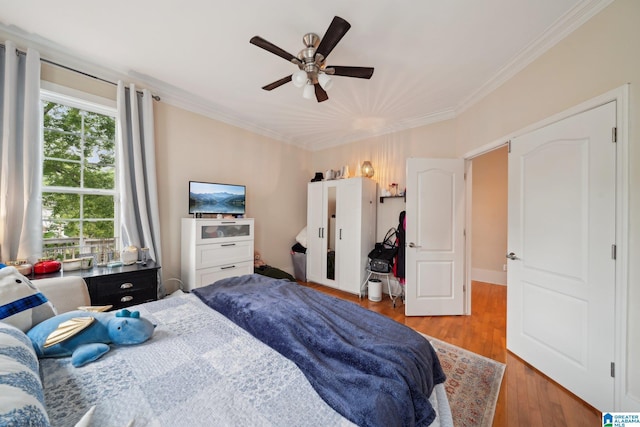 1710 Cullom St S, Birmingham, AL 35205 - bedroom with crown molding, wood finished floors, and a ceiling fan