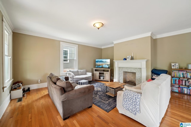 1710 Cullom St S, Birmingham, AL 35205 - living room with a fireplace, light wood finished floors, crown molding, and baseboards