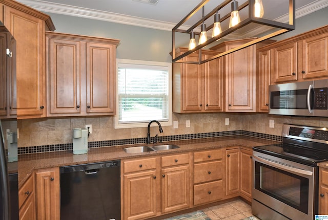 100 Weeping Cir, Wilsonville, AL 35186 - kitchen featuring stainless steel appliances, a sink, backsplash, crown molding, and brown cabinetry