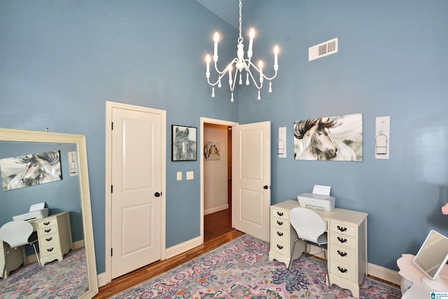 100 Weeping Cir, Wilsonville, AL 35186 - office with high vaulted ceiling, a chandelier, wood finished floors, and baseboards