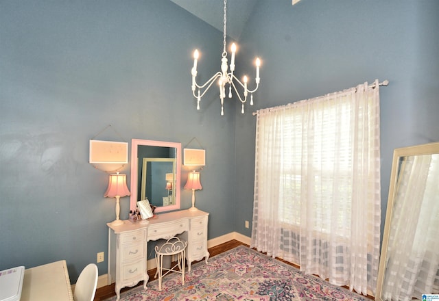 100 Weeping Cir, Wilsonville, AL 35186 - office space with a chandelier, lofted ceiling, baseboards, and wood finished floors