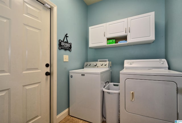 100 Weeping Cir, Wilsonville, AL 35186 - washroom featuring cabinet space, independent washer and dryer, and baseboards