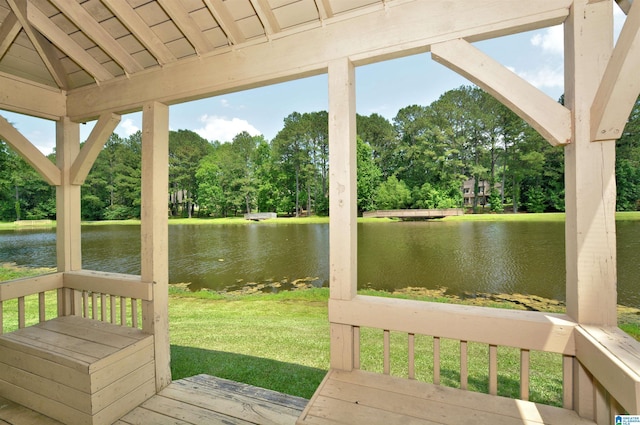 100 Weeping Cir, Wilsonville, AL 35186 - wooden terrace featuring a water view, view of wooded area, and a lawn