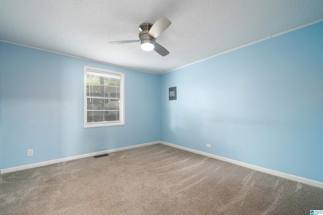220 Honeysuckle Ln, Gardendale, AL 35071 - carpeted empty room featuring a textured ceiling, crown molding, a ceiling fan, and baseboards