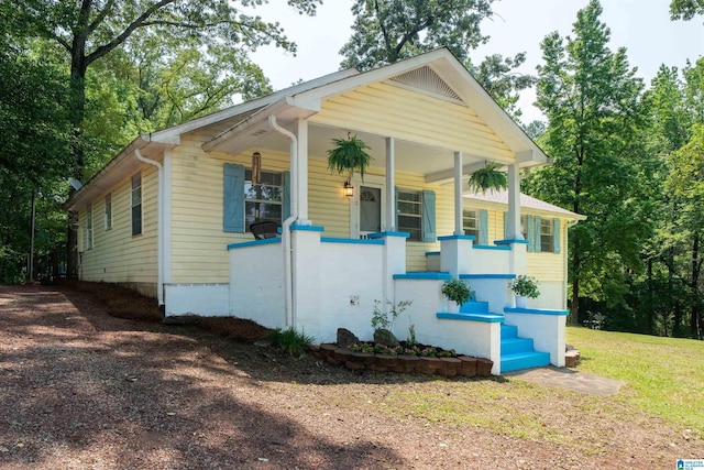 220 Honeysuckle Ln, Gardendale, AL 35071 - bungalow-style home featuring a porch