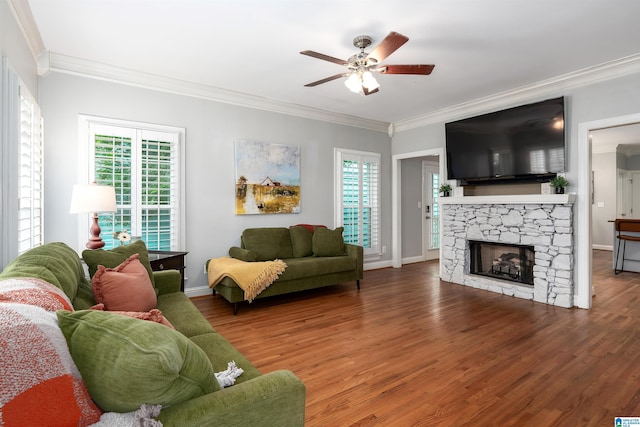145 Lake Davidson Ln, Helena, AL 35080 - living area featuring crown molding, ceiling fan, wood finished floors, and a fireplace