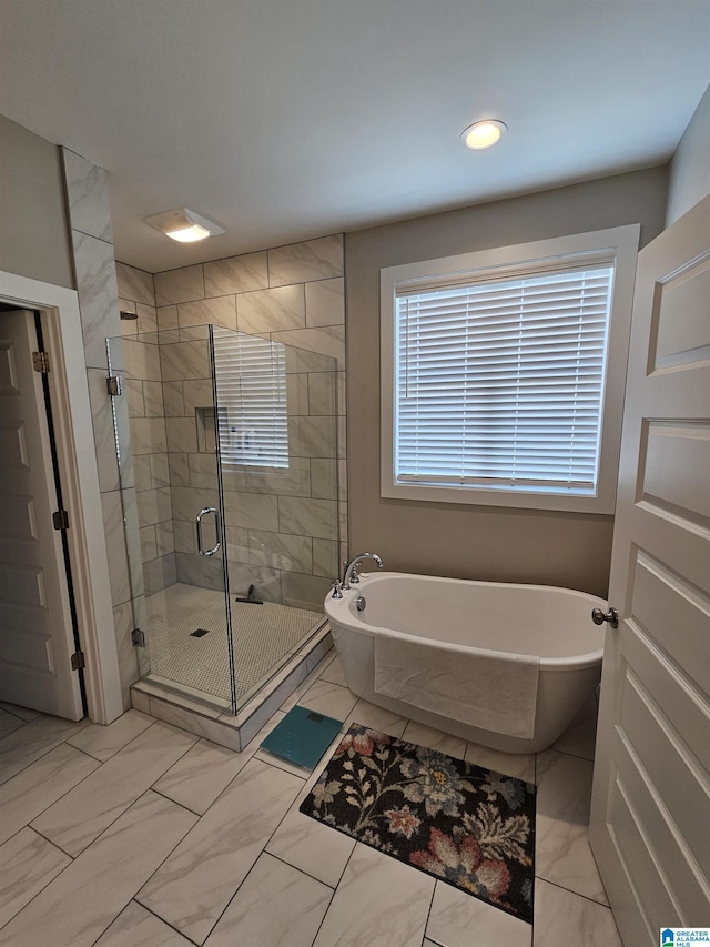 345 Easonville Park Dr, Cropwell, AL 35054 - full bathroom featuring a freestanding bath, a shower stall, and marble finish flooring