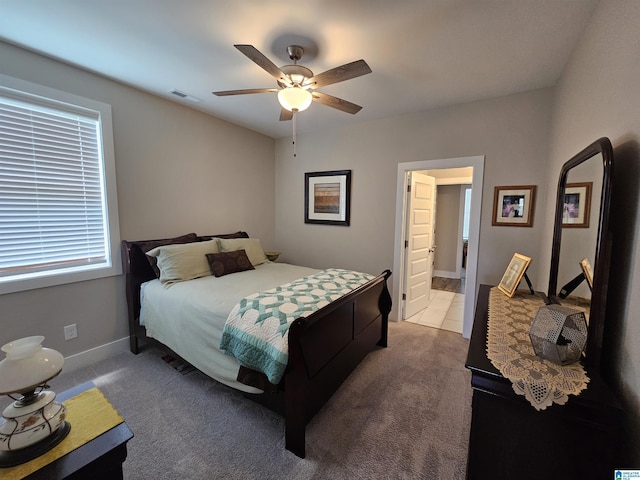 345 Easonville Park Dr, Cropwell, AL 35054 - bedroom featuring light carpet, ceiling fan, and baseboards