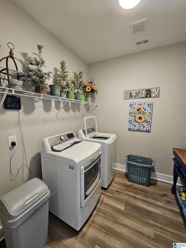 345 Easonville Park Dr, Cropwell, AL 35054 - laundry room with washing machine and dryer, wood finished floors, and baseboards