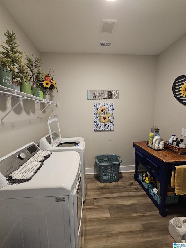 345 Easonville Park Dr, Cropwell, AL 35054 - washroom with washing machine and clothes dryer, dark wood-style floors, and baseboards