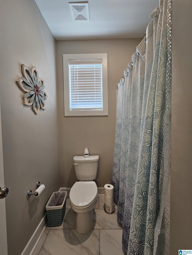 345 Easonville Park Dr, Cropwell, AL 35054 - bathroom with toilet, baseboards, and marble look tile flooring