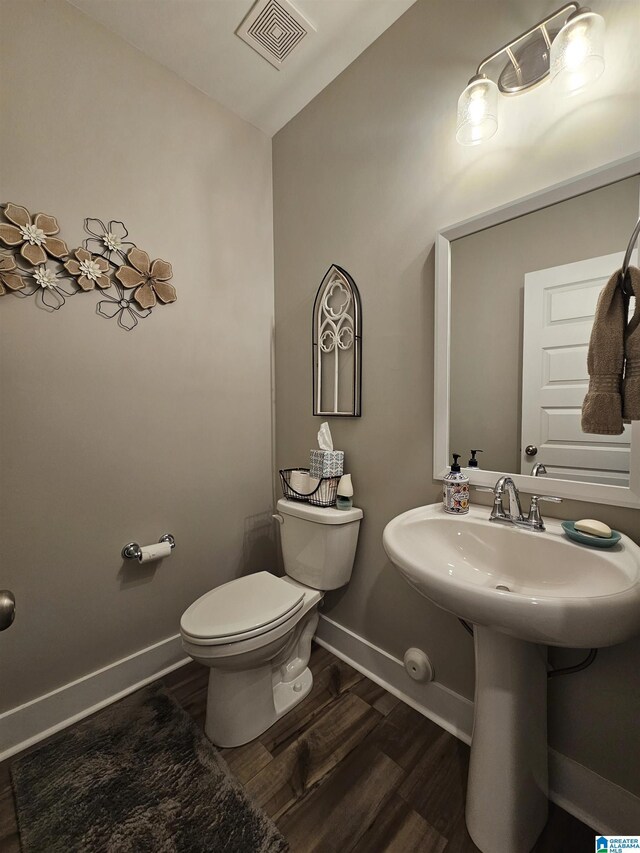 345 Easonville Park Dr, Cropwell, AL 35054 - half bathroom featuring baseboards, toilet, wood finished floors, and lofted ceiling