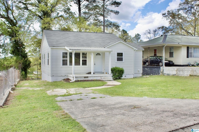 2912 Moore Ave, Anniston, AL 36201 - ranch-style home with crawl space, a porch, and a carport