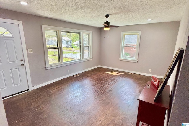 2912 Moore Ave, Anniston, AL 36201 - foyer with dark wood-style floors, a ceiling fan, a textured ceiling, baseboards, and recessed lighting