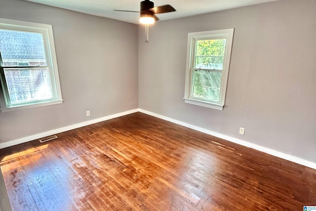 2912 Moore Ave, Anniston, AL 36201 - spare room featuring wood finished floors, baseboards, and ceiling fan