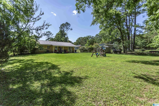 209 Meadowgreen Dr, Montevallo, AL 35115 - view of grassy yard with a playground