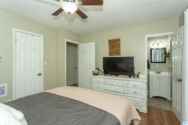 209 Meadowgreen Dr, Montevallo, AL 35115 - bedroom with dark wood finished floors and ceiling fan