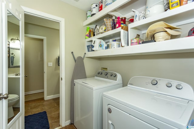 209 Meadowgreen Dr, Montevallo, AL 35115 - laundry room featuring washer and clothes dryer, tile patterned floors, and baseboards