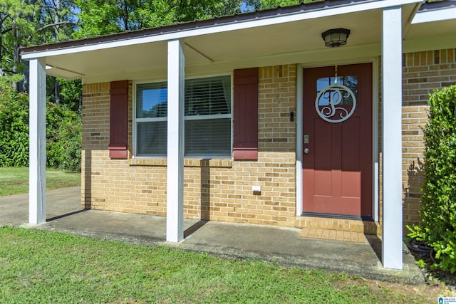 209 Meadowgreen Dr, Montevallo, AL 35115 - property entrance with brick siding and covered porch