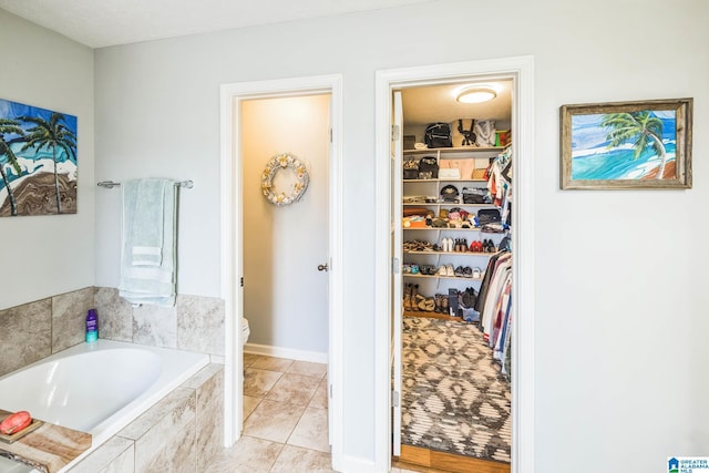 736 Buena Vista Loop, Prattville, AL 36067 - bathroom with a bath, toilet, and a spacious closet
