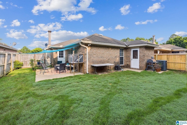 736 Buena Vista Loop, Prattville, AL 36067 - rear view of property featuring brick siding, a patio area, and central AC unit