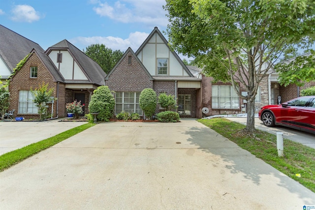 2449 Ridgemont Dr, Birmingham, AL 35244 - tudor house featuring stucco siding and brick siding