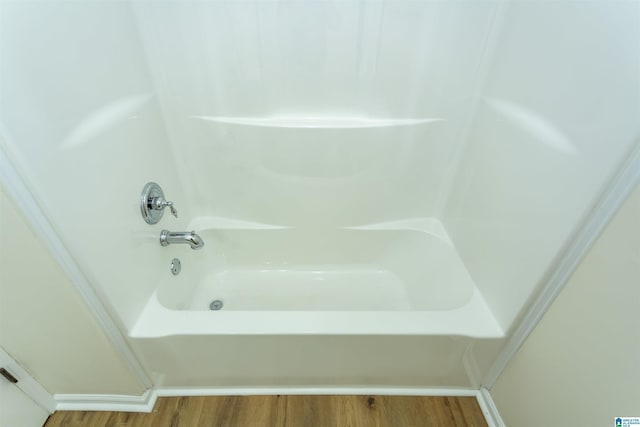 2449 Ridgemont Dr, Birmingham, AL 35244 - full bath featuring wood finished floors and shower / tub combination