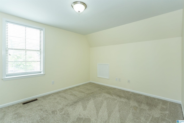 2449 Ridgemont Dr, Birmingham, AL 35244 - additional living space with carpet floors, baseboards, and lofted ceiling